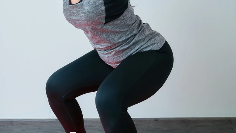 woman doing squats