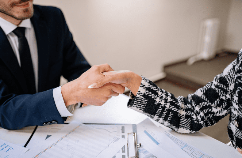 woman shaking hands