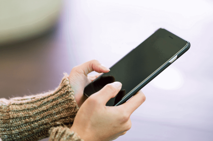 Woman using handphone