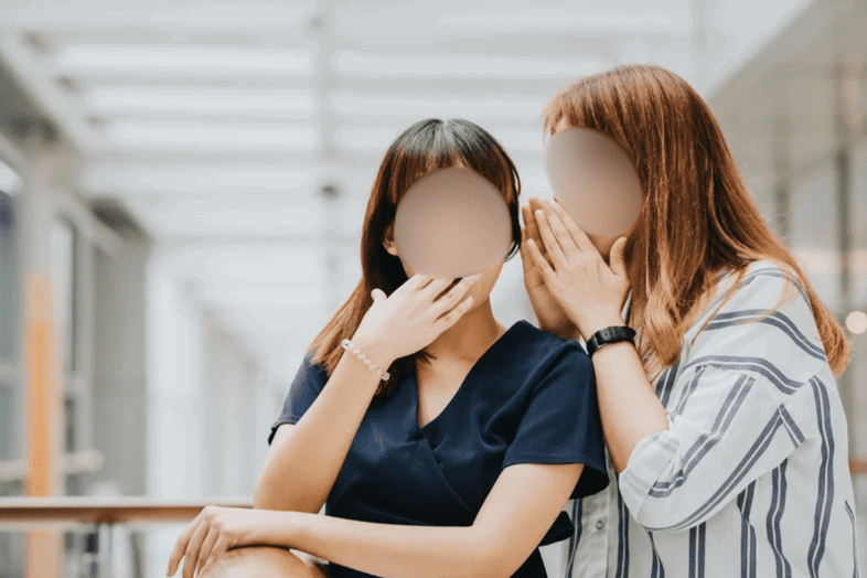 Women gossiping