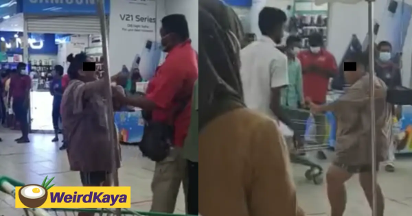 Woman fighting with security guard at Econsave Klang