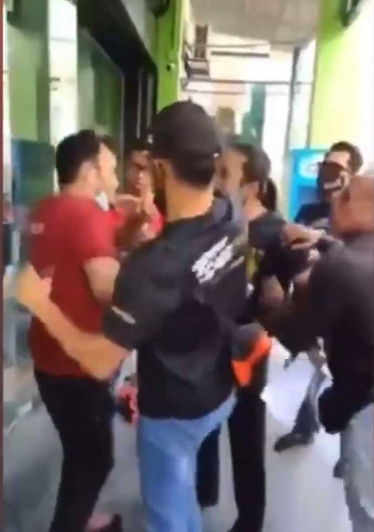 Foreign worker slapped, beaten over sale of counterfeit shirts