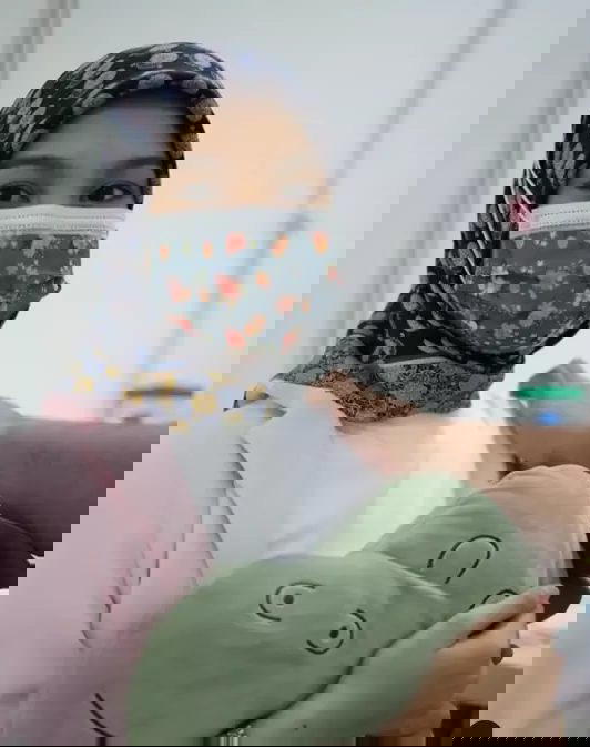 Netizens slam local artist for recording herself at COVID vaccination center
