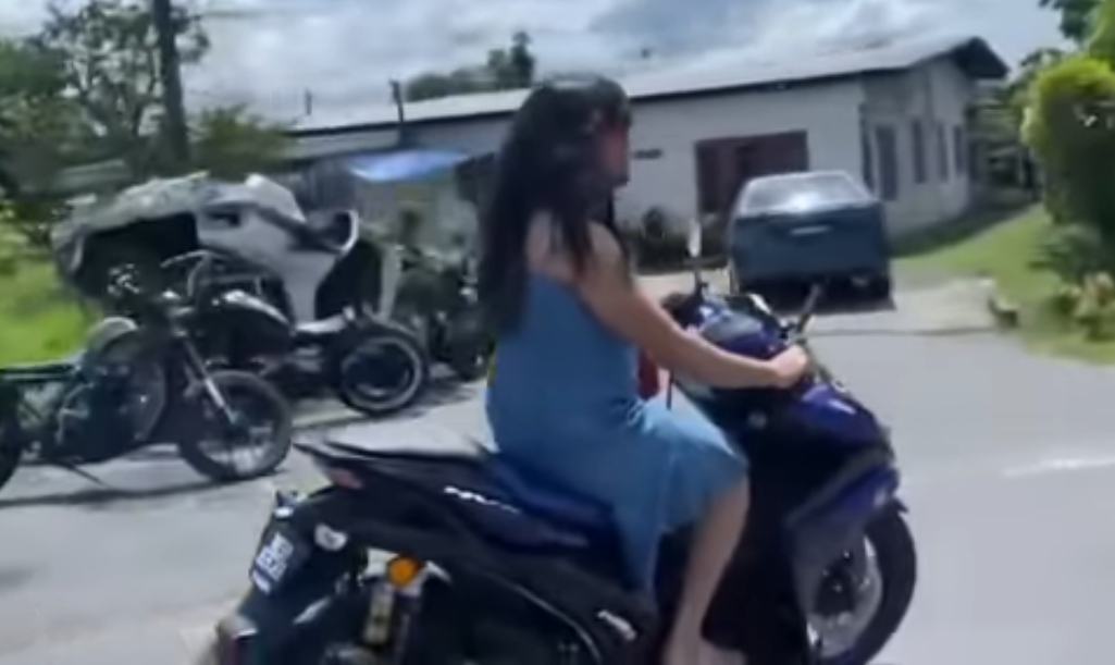 Man in sundress summoned by police for riding without a helmet on his motorcycle