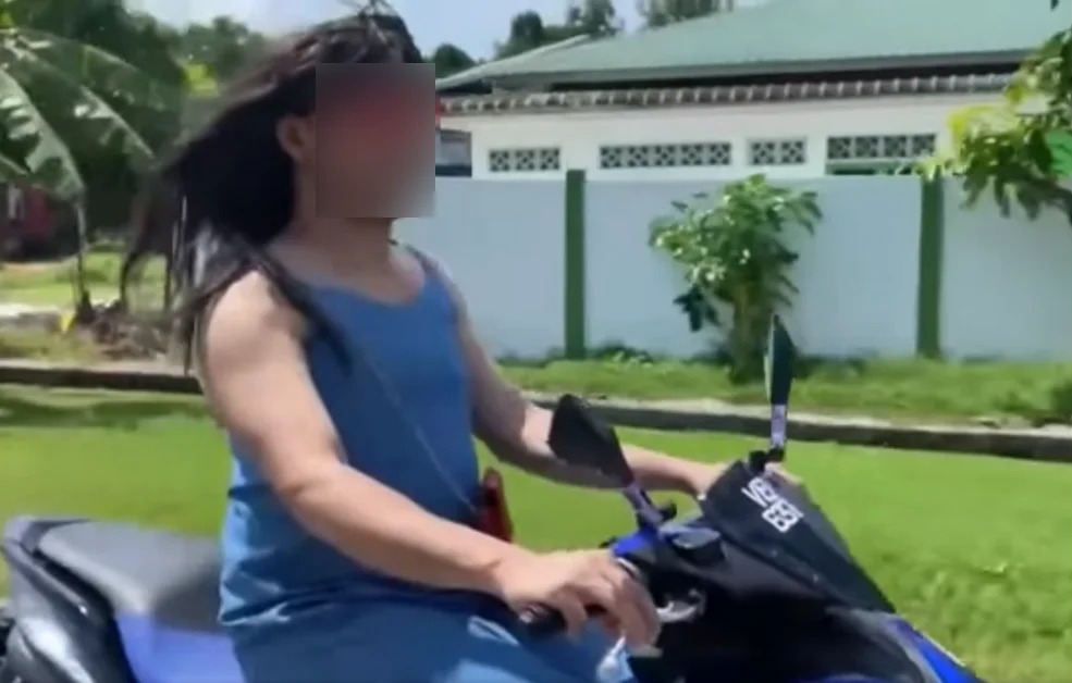 Man in sundress summoned by police for riding without a helmet on his motorcycle
