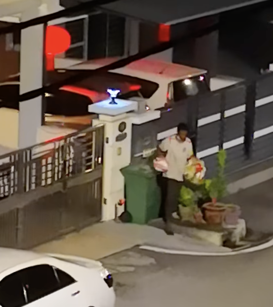 Desperate times: man scavenges for food from rubbish bin at 3am