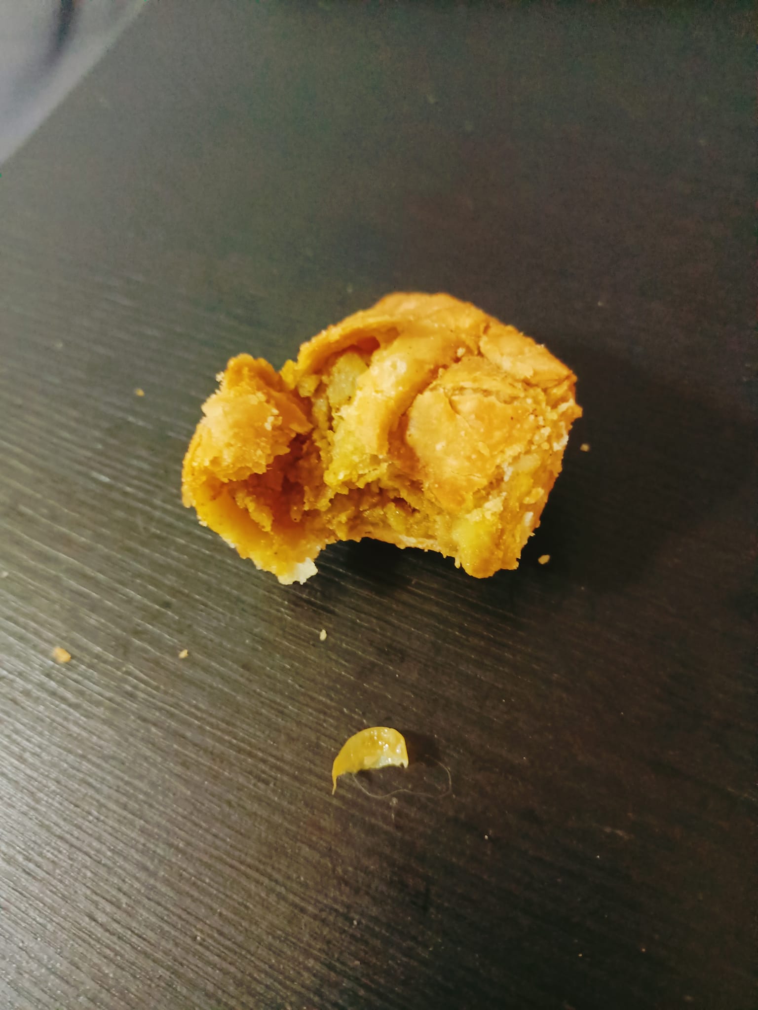 Extra ingredient found in woman's curry puff.