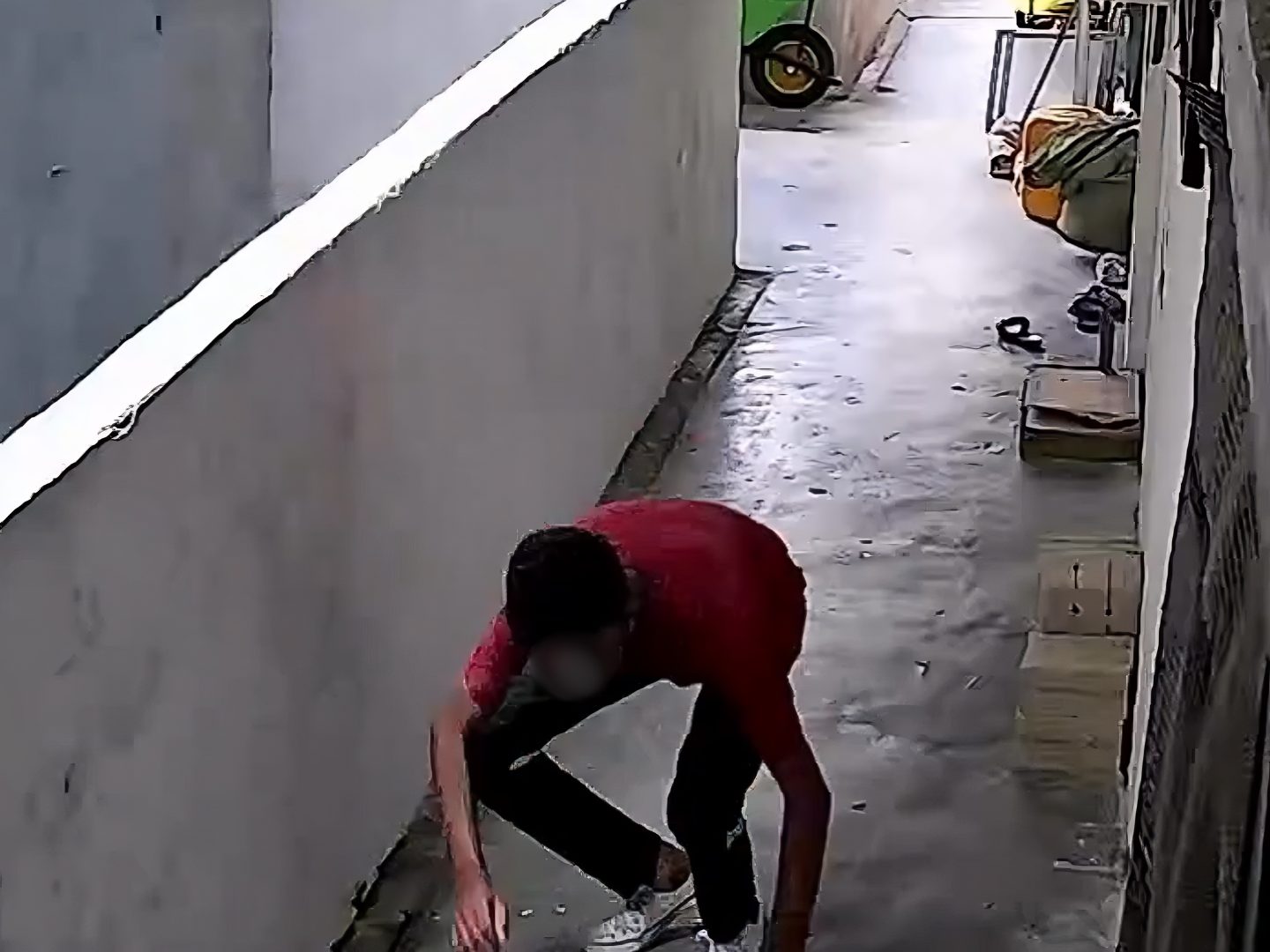 wk throwing brick down floor ( )