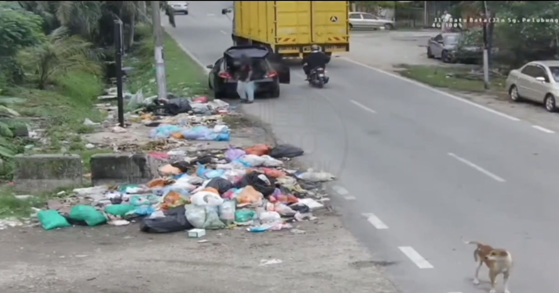  wk “pick it up now” — men dump trash, then forced to take it back after cctv warning... 