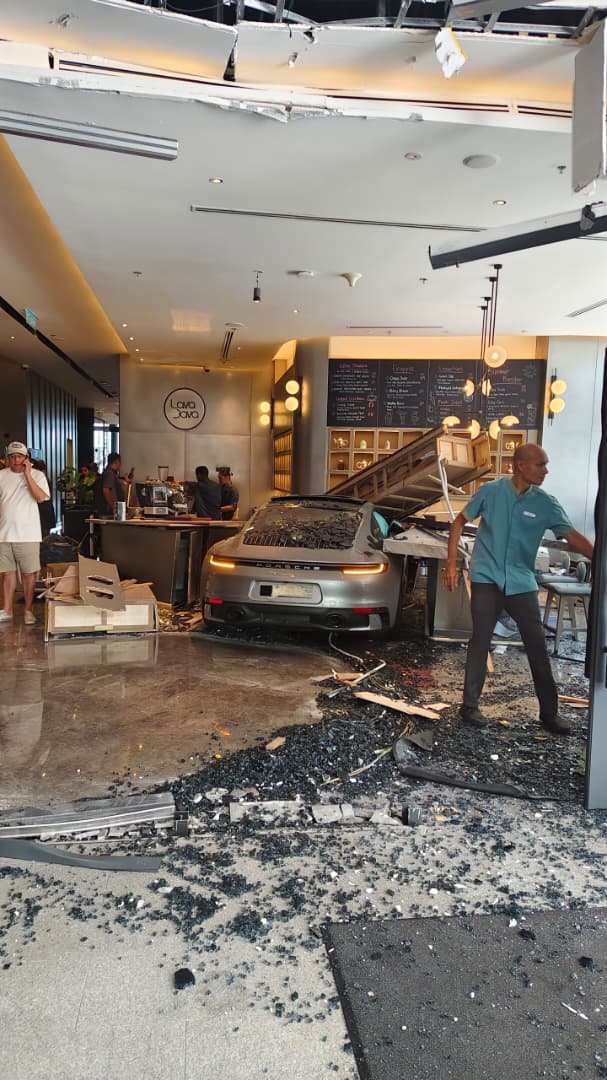 wk porsche crashes into hotel cafe in penang