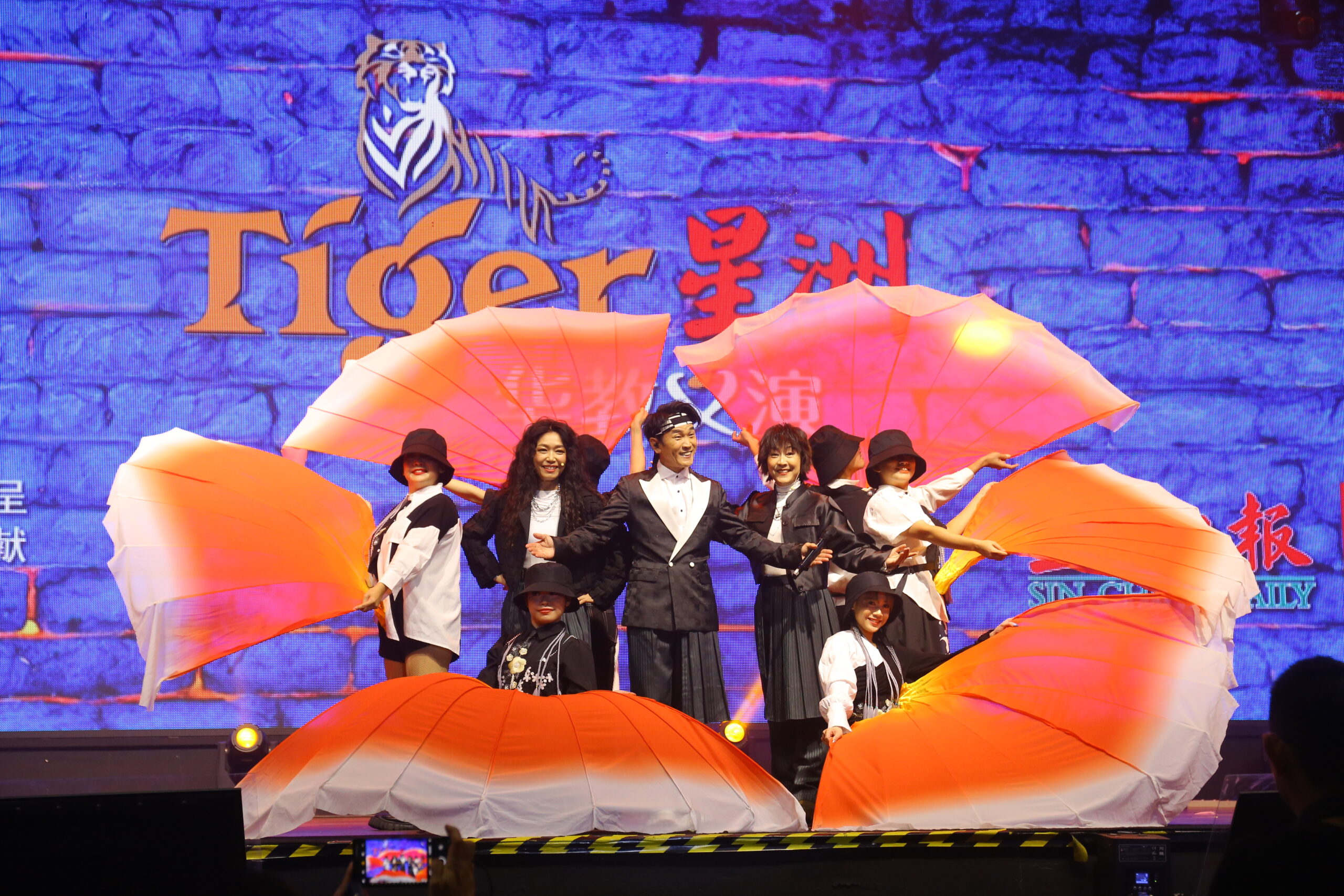 Freddie & catz performing for tiger chinese education charity concert
