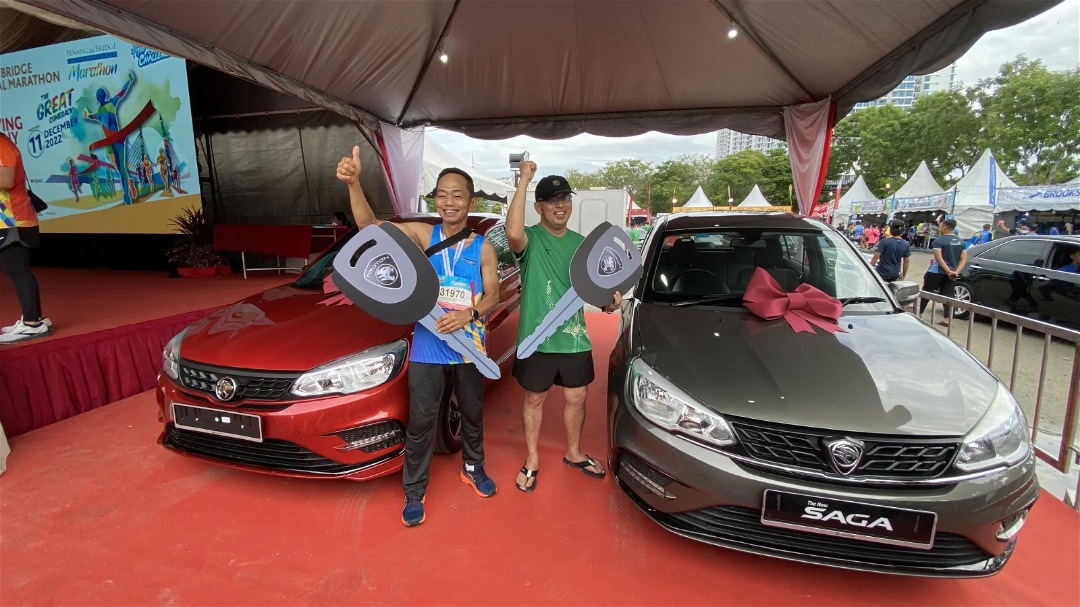 55yo m'sian wins a proton car from penang bridge international marathon lucky draw after 13 winners didn't show up to collect