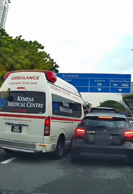 Ambulance and mercedes collide