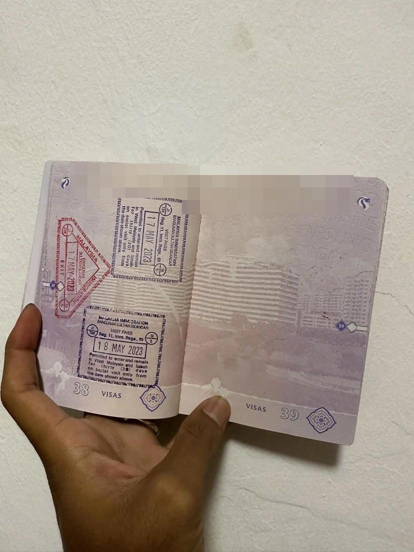 Passport of the sg man who was barred from entering malaysia.