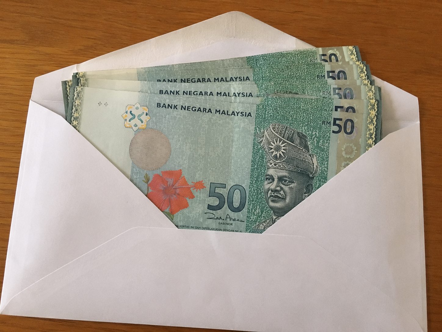 AI image of cash inside envelope