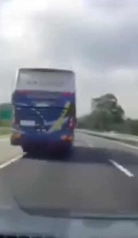 Bus driver with woman on lap (2)