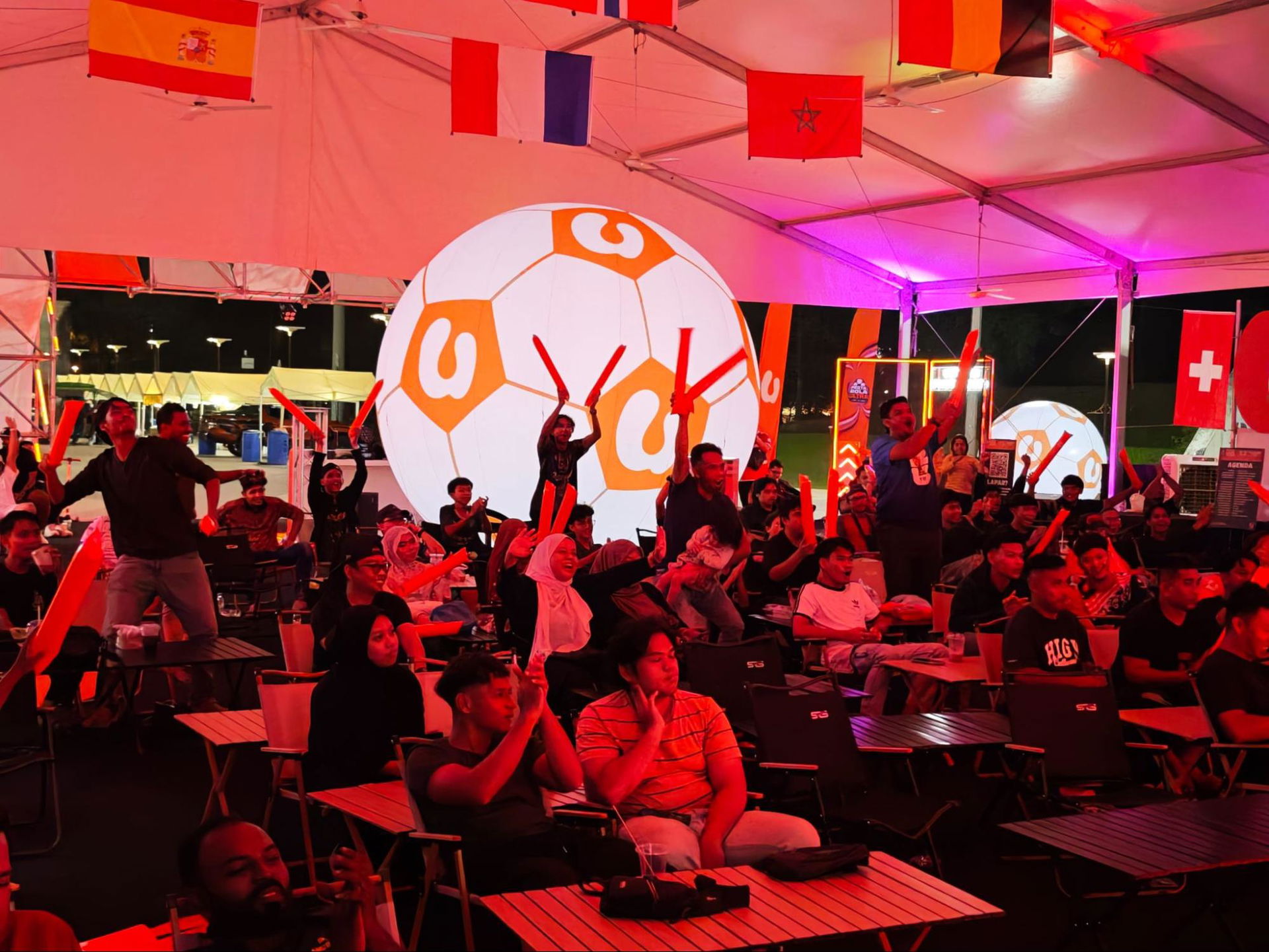 Fans cheering U Mobile Ultra Football Fest