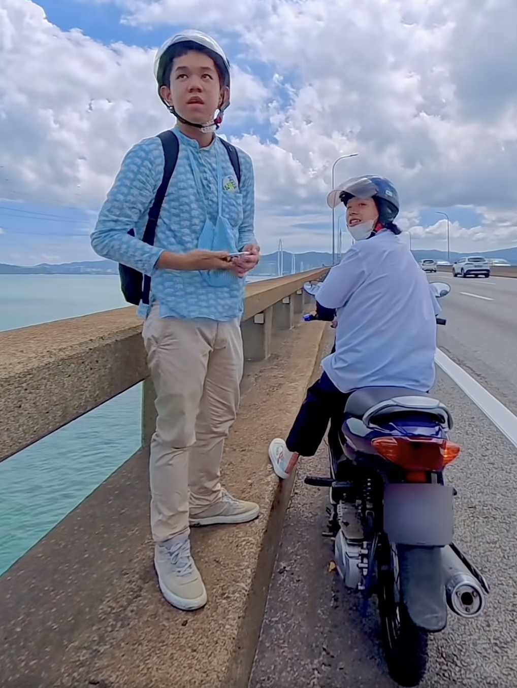 Foreigners with burst motorcycle tyres