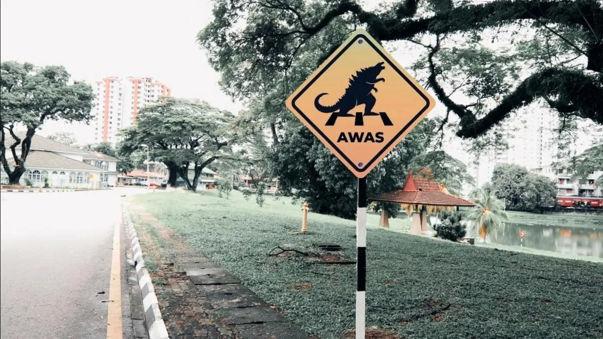 Godzilla crossing sign at usm