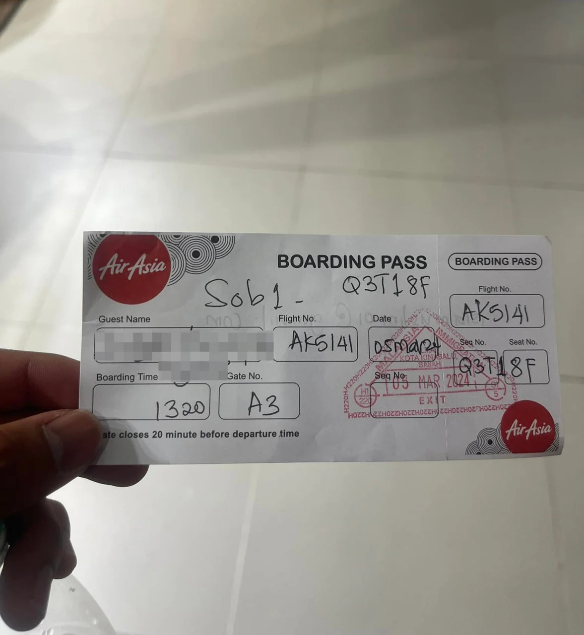 Handwritten boarding pass