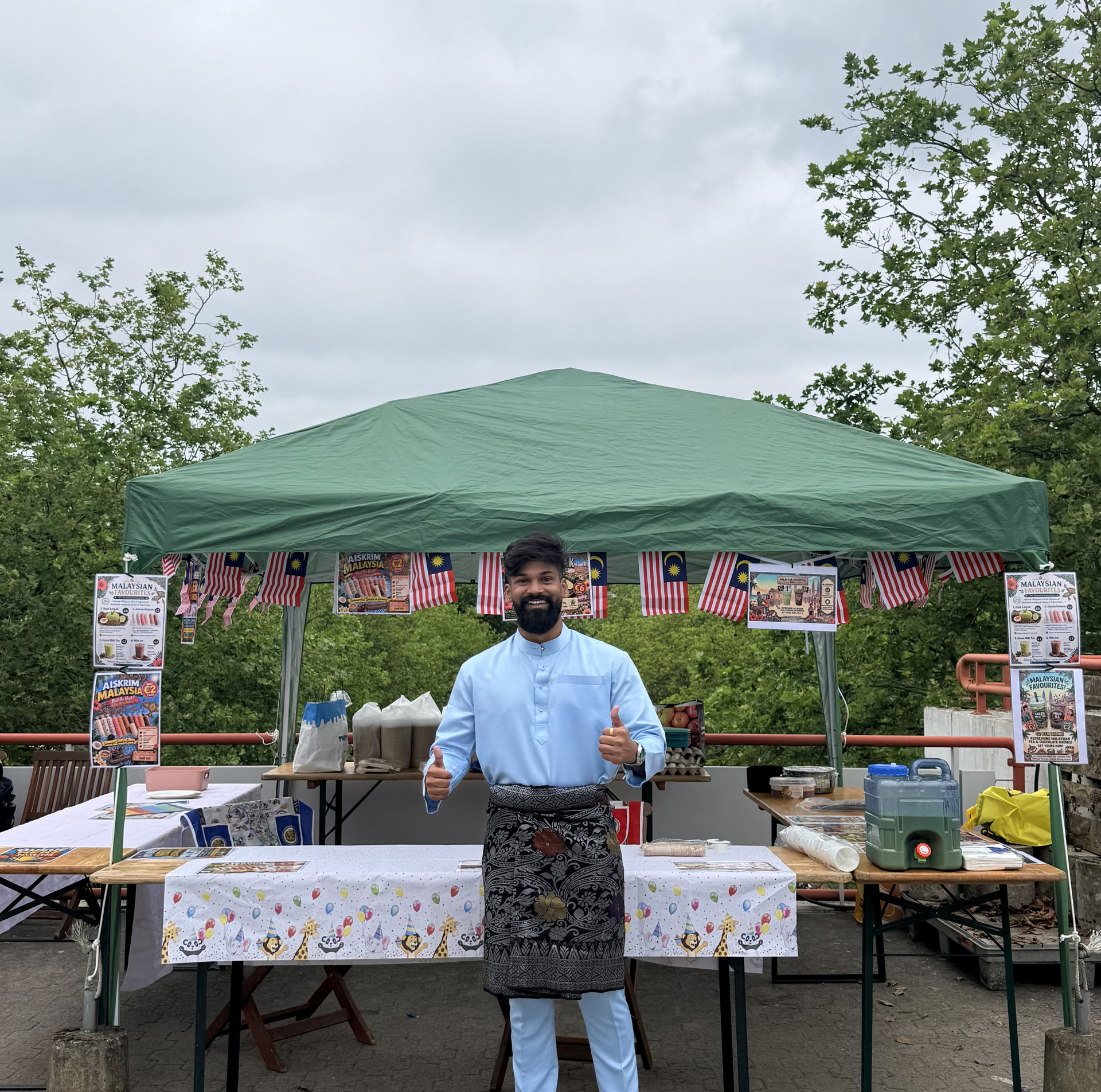 Raaj in front of his booth in Germany for sommerfest