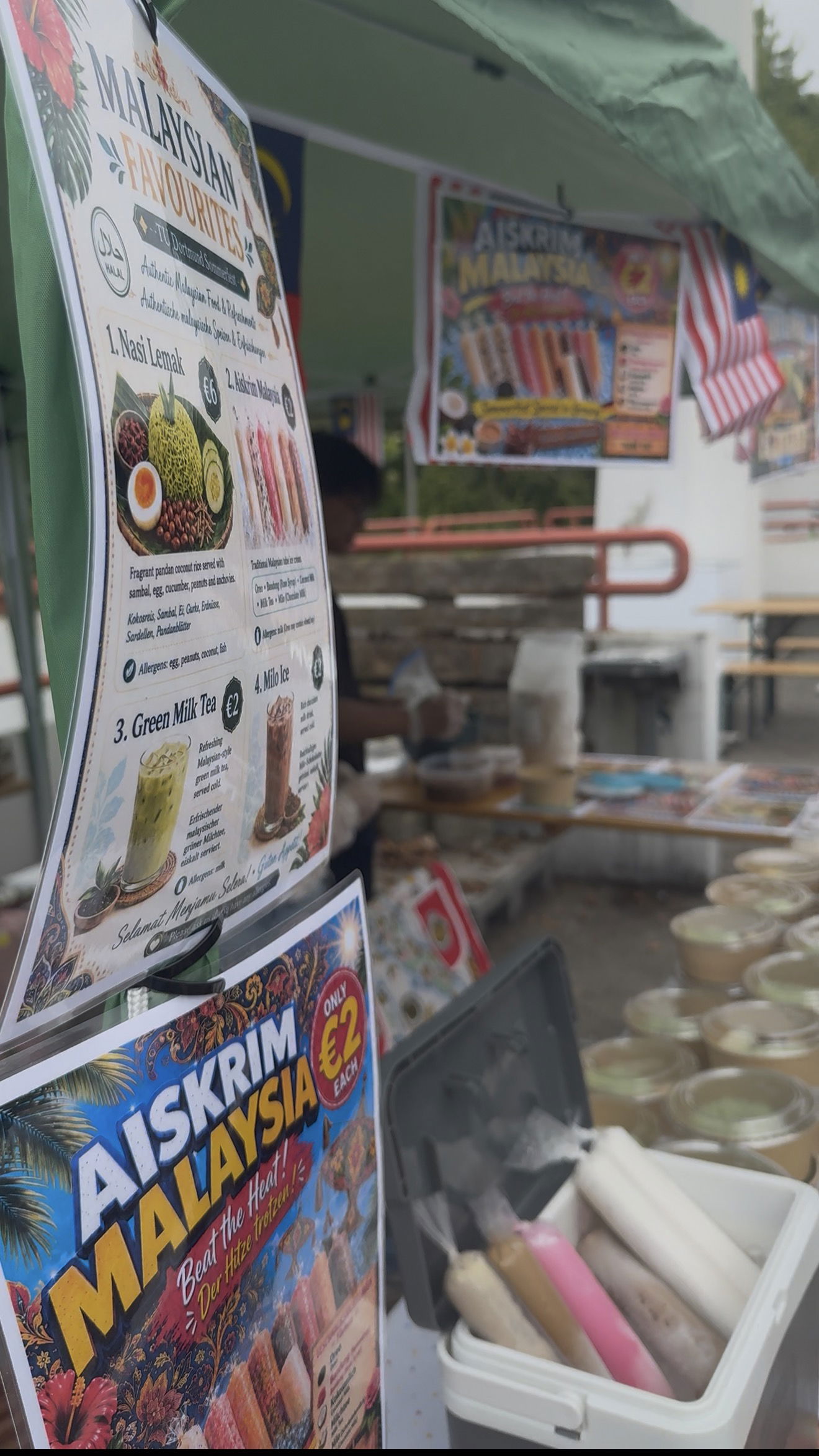 Malaysian food in his booth