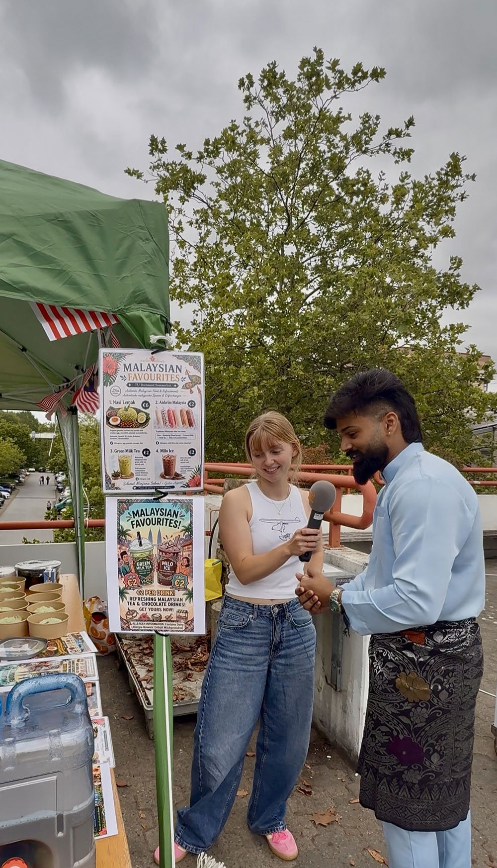 Raaj talking with an interviewer