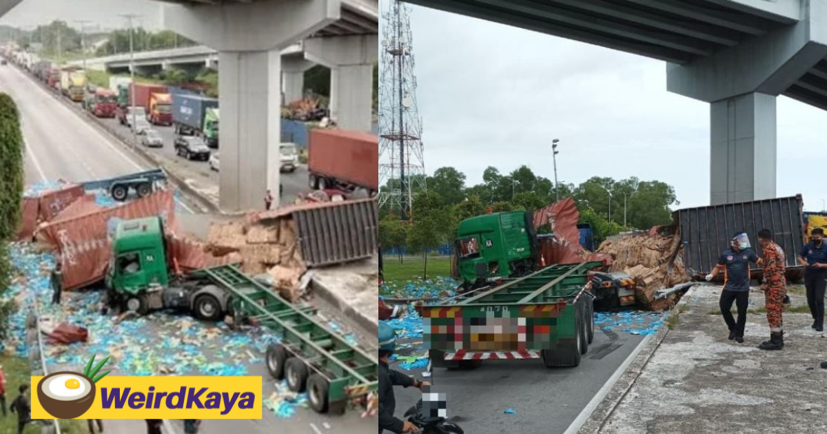 Container falls off klang flyover, crushing two lorries and injuring one driver | weirdkaya