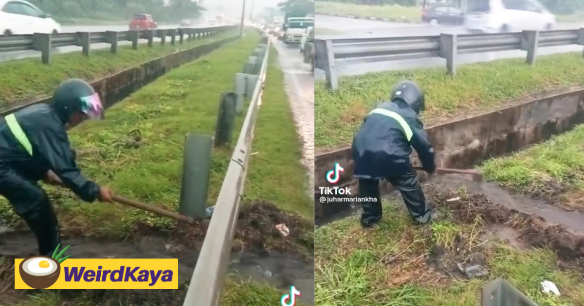 M'sian man drains flooded highway road by digging pathway under heavy rain | weirdkaya