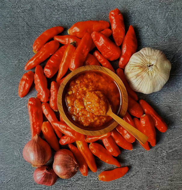 [video] woman requests for extra sambal, gets her meal 'flooded' in it | weirdkaya