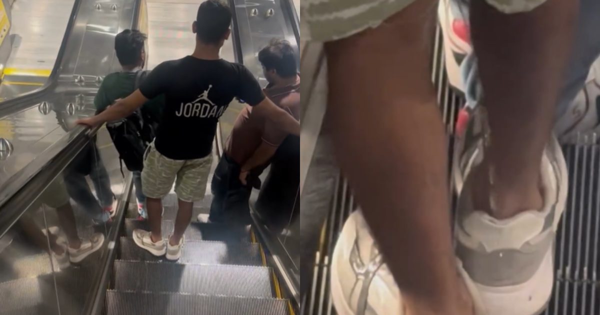 Man pees on escalator (1)