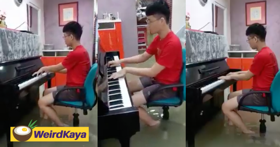 M'sian calmly plays 'River Flows in You' on the piano as his house gets flooded'