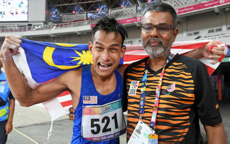 'please return to us' paralympic gold medallist ridzuan puzi tearfully begs to be reunited with his coach | weirdkaya