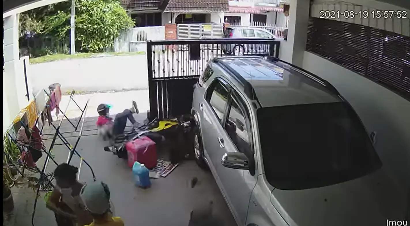 Rider crashes into house gate due to unleashed dog, shocks occupants