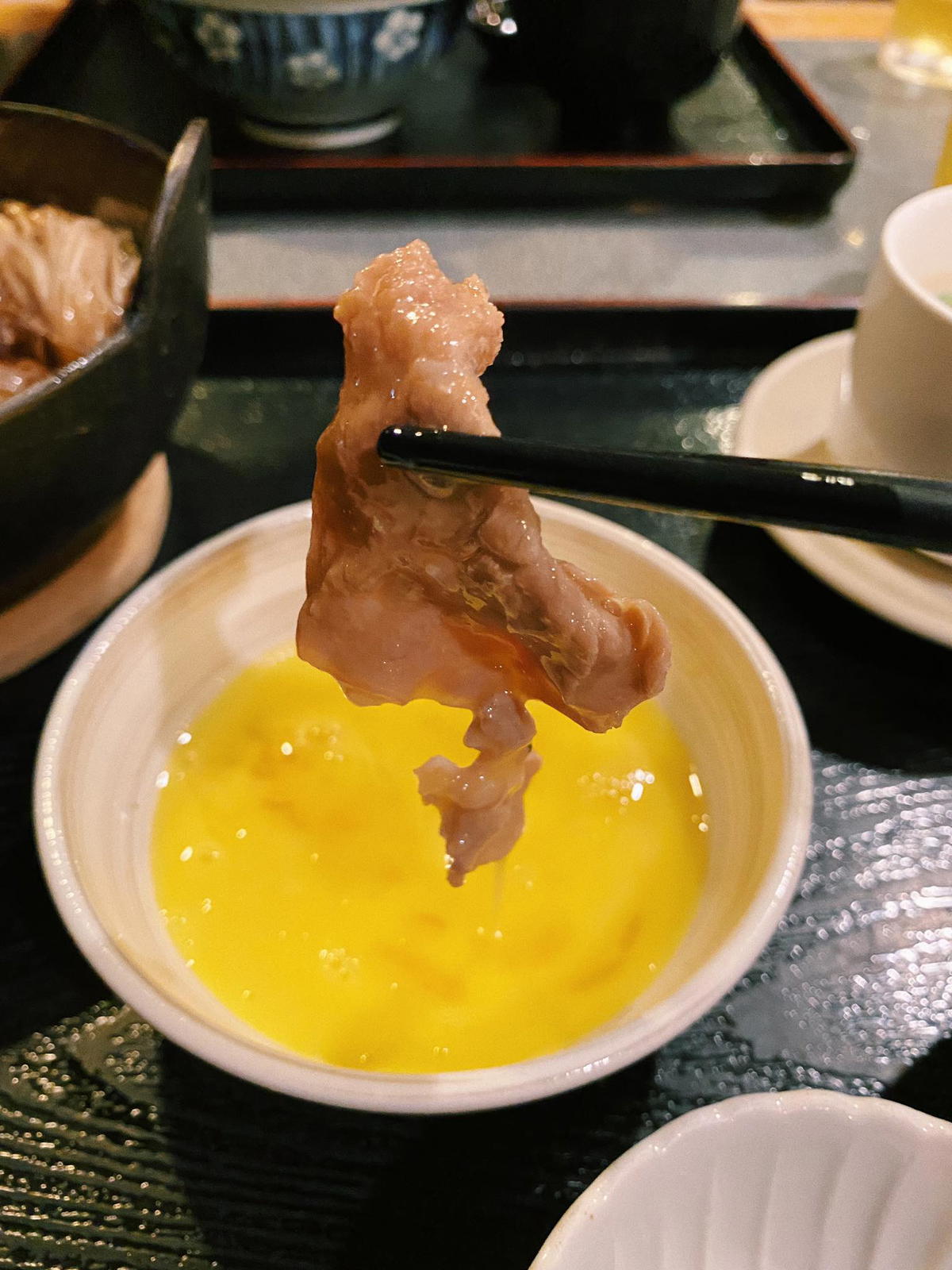 Sukiyaki beef indulges in raw egg