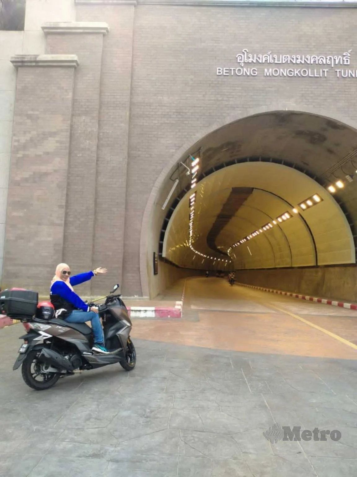 Taking photo at tunnel entrance