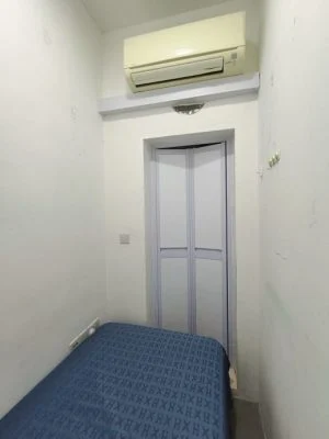 Tiny bed with aircond