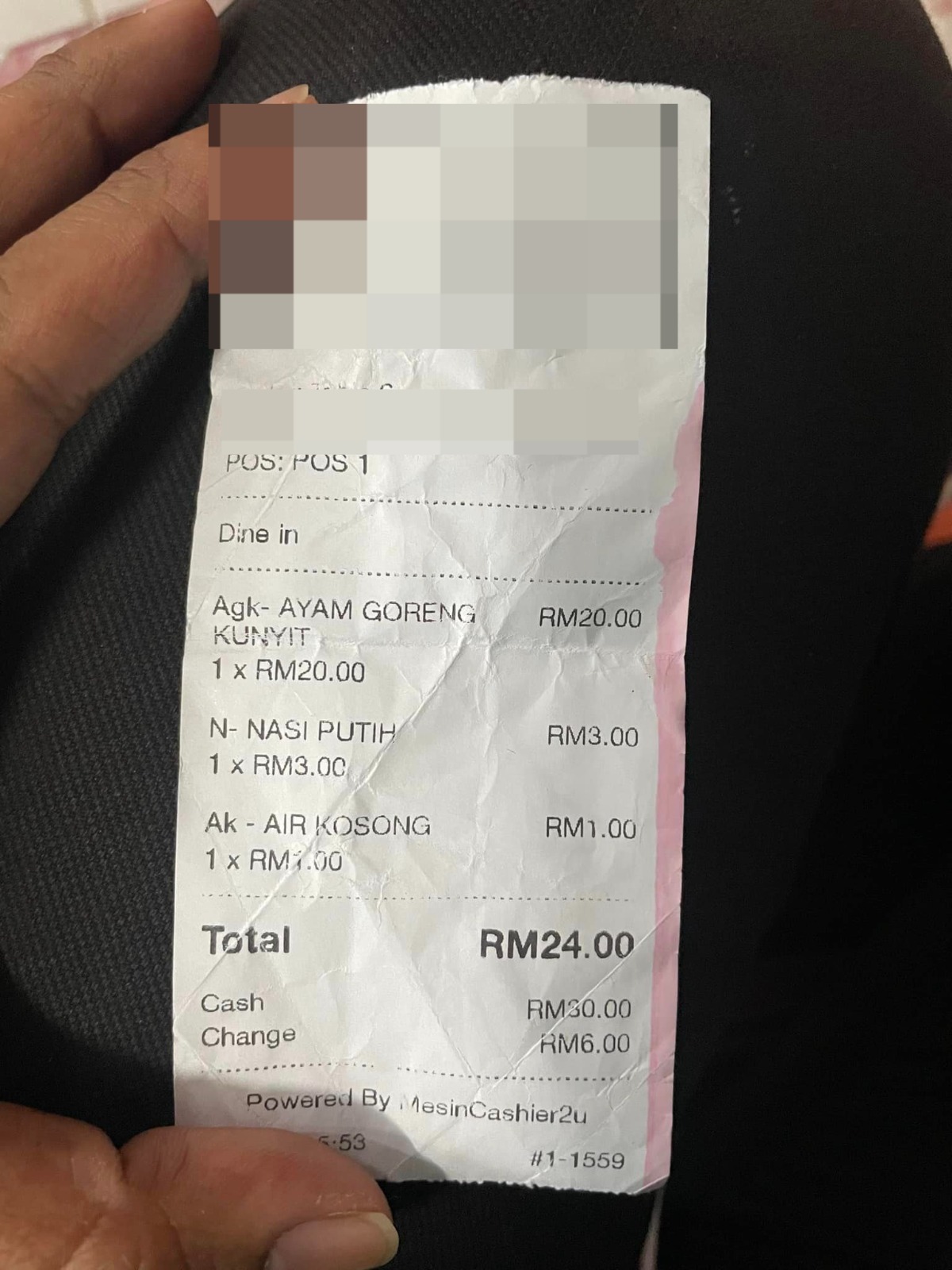 A bill from langkwai restautant that charged a customer rm23 for nasi ayam goreng kunyit