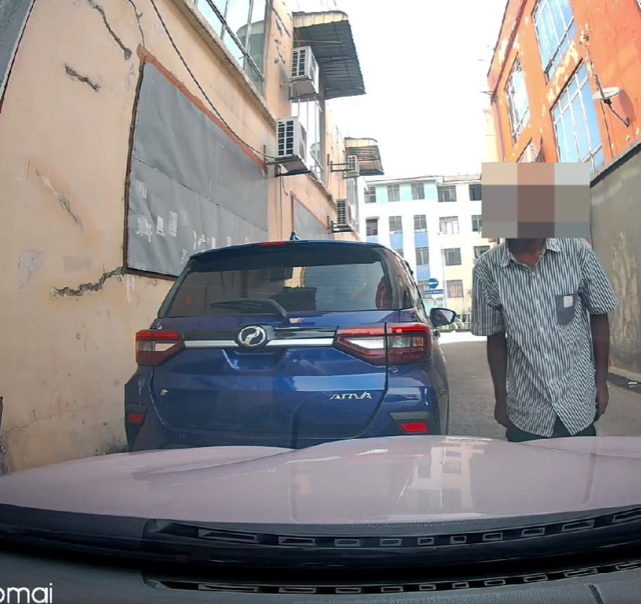 a man pulling down his pant