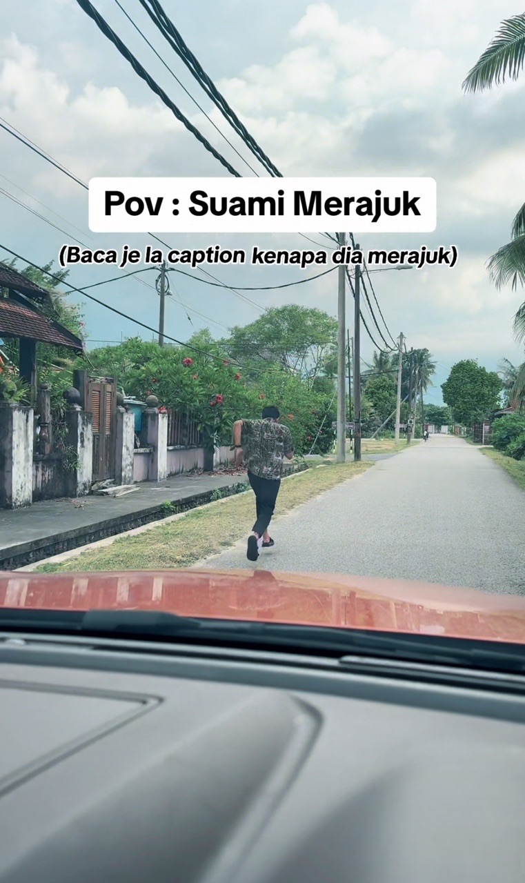 A man running along the roadside