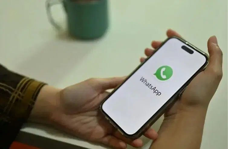 A person using WhatsApp