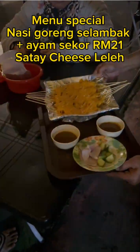 A serving of satay cheese meleleh along with diced cucumber and onion