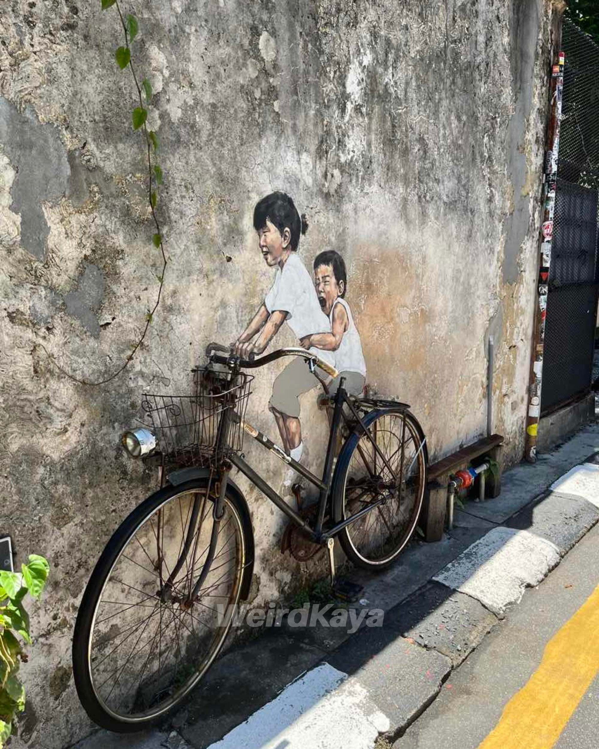 Here’s how penang’s iconic ‘children on a bicycle’ mural looks before & after makeover | weirdkaya