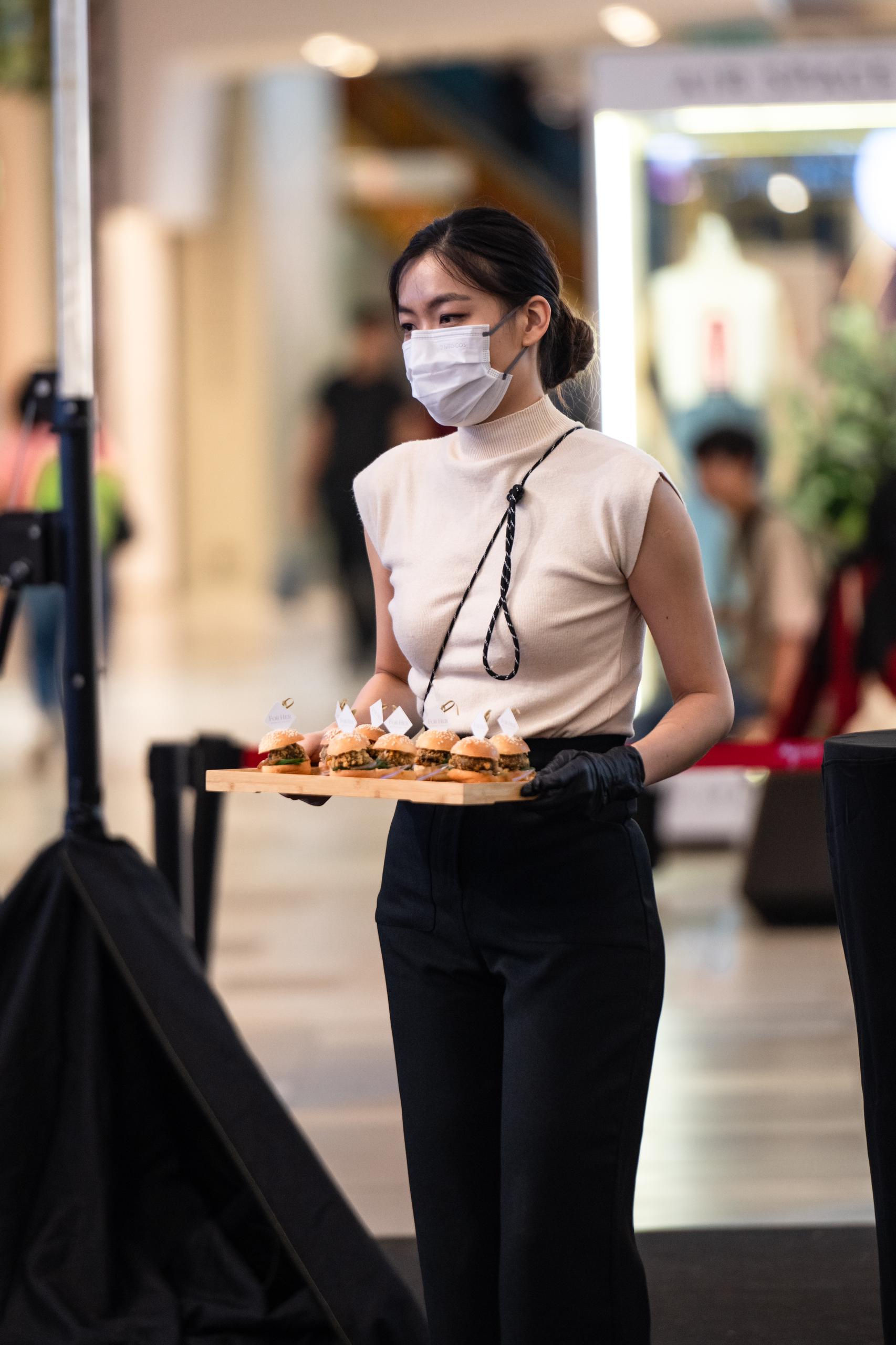 Alysia serving dessert during event