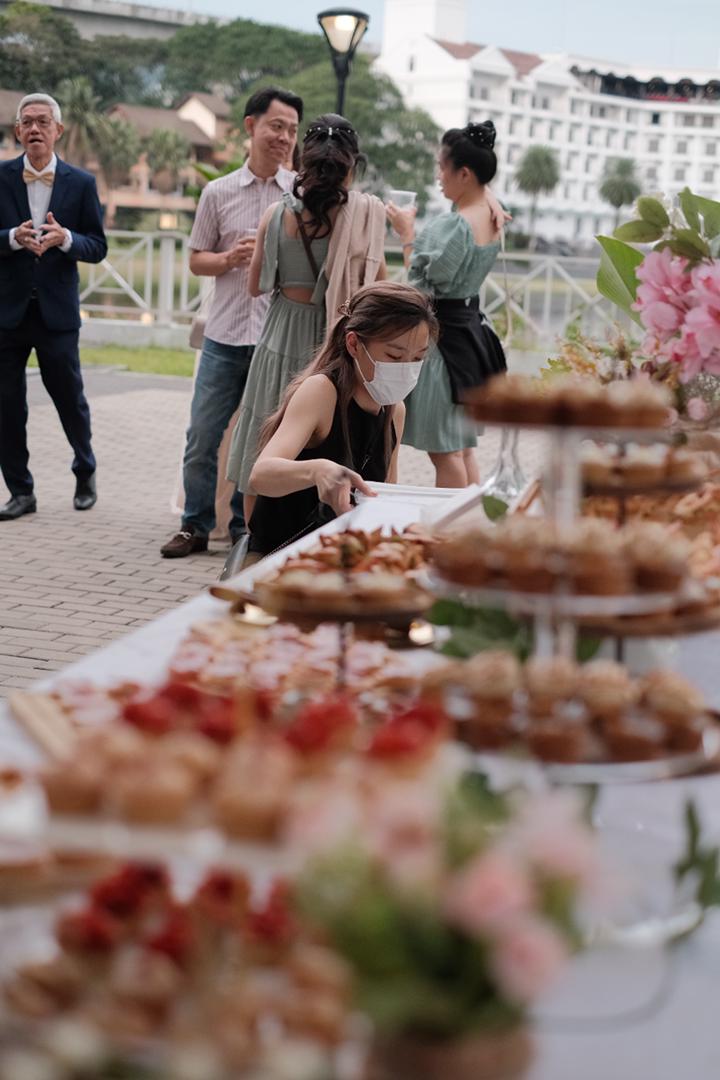 Alysia setting up dessert table 3