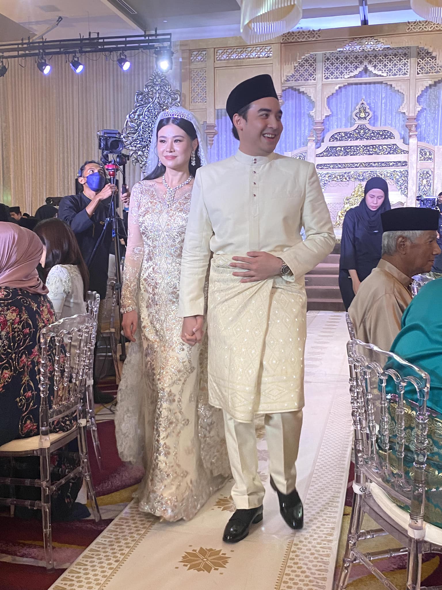 Ashman najib and nikola mulyadi in wedding costumes