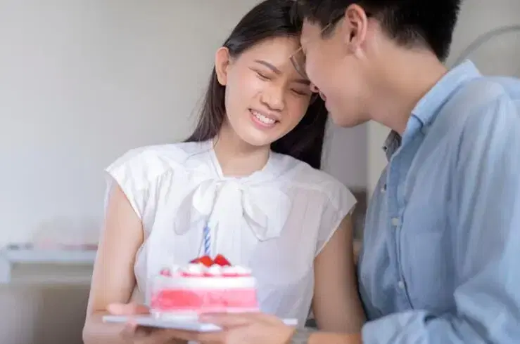Asian couple celebrating birthday
