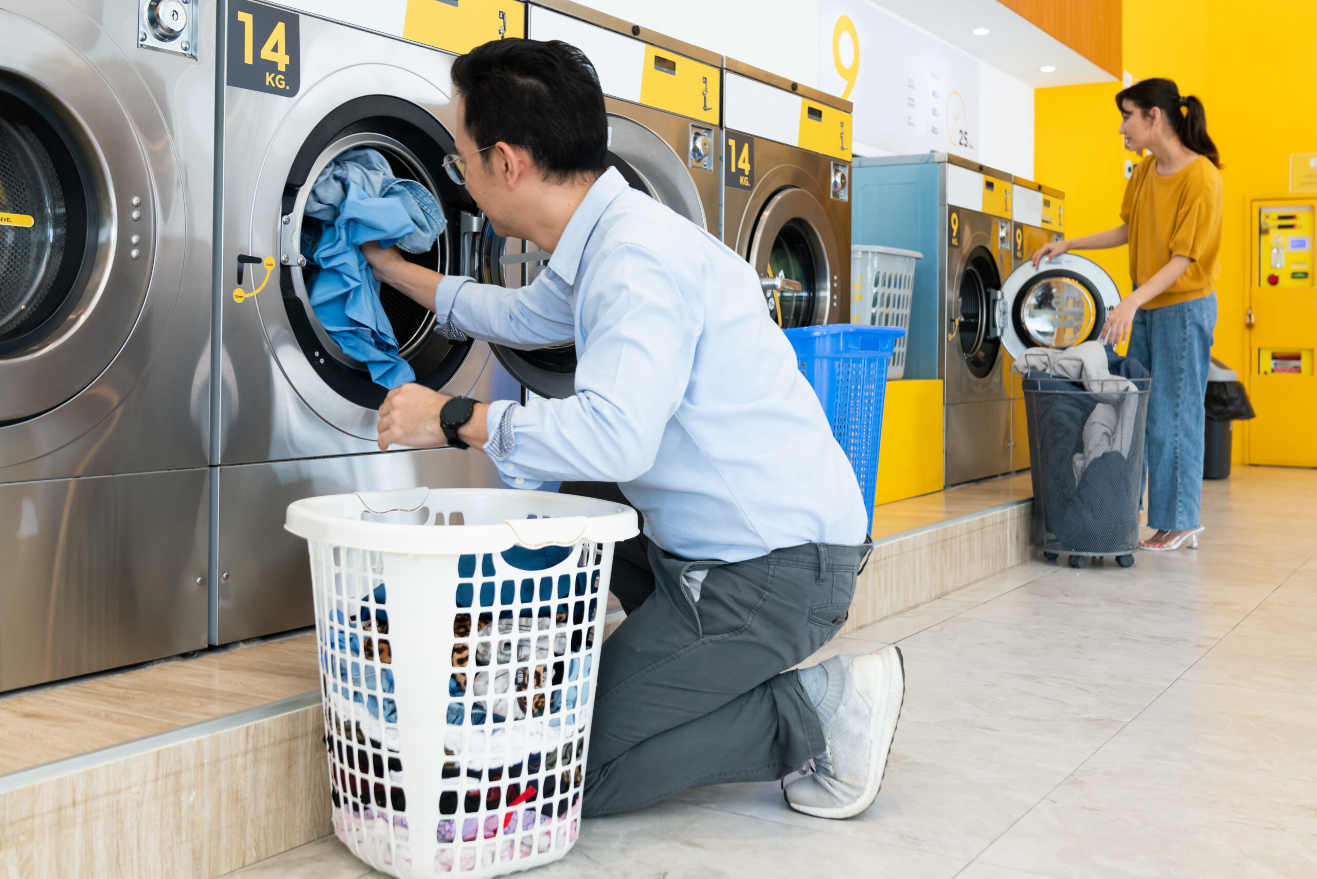 People using the self-service laundromats