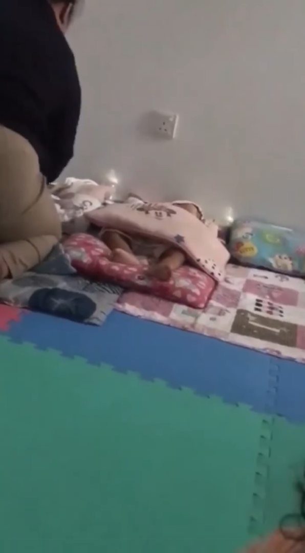 21yo m'sian babysitter handling crying babies in  a rough manner