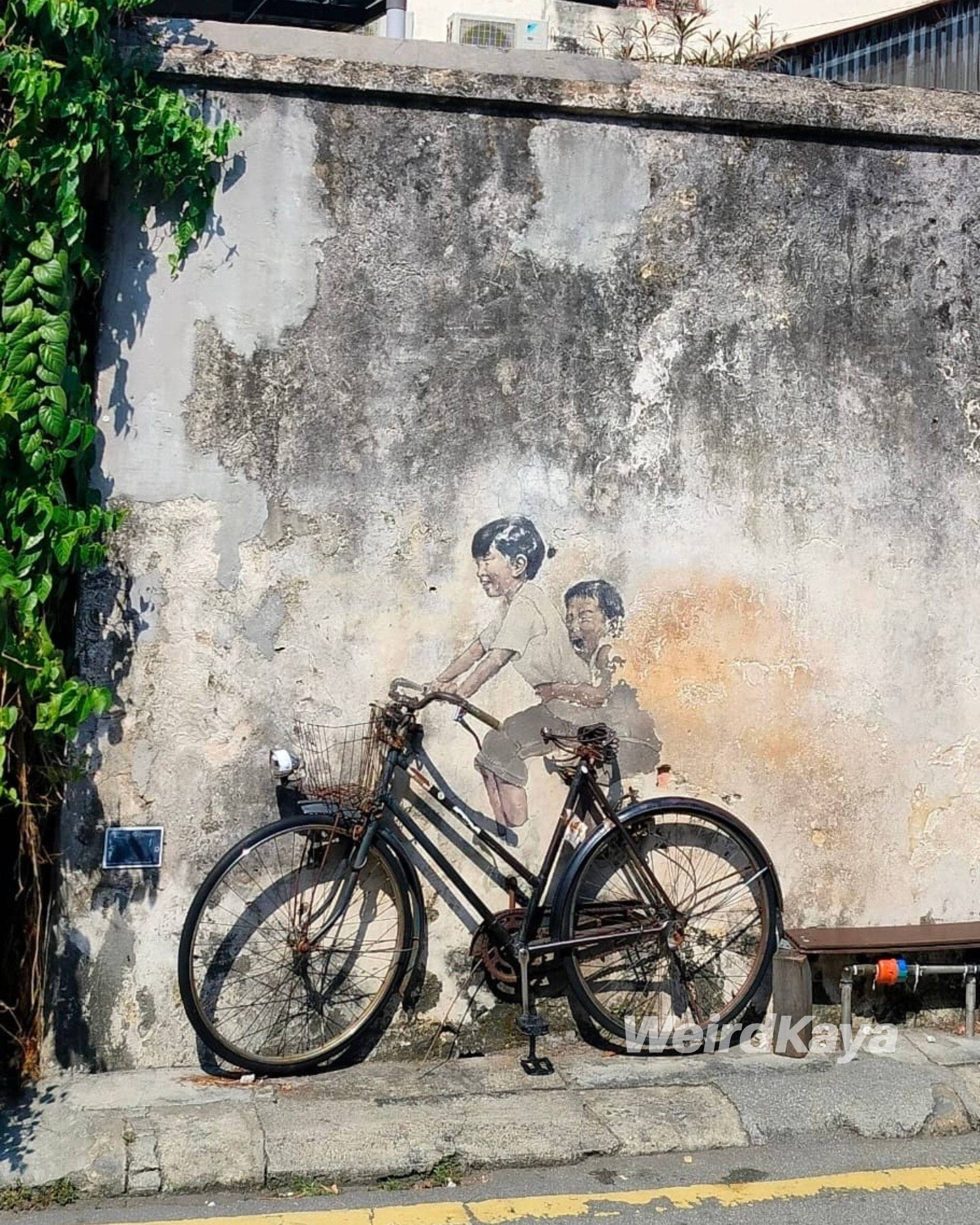 Here’s how penang’s iconic ‘children on a bicycle’ mural looks before & after makeover | weirdkaya